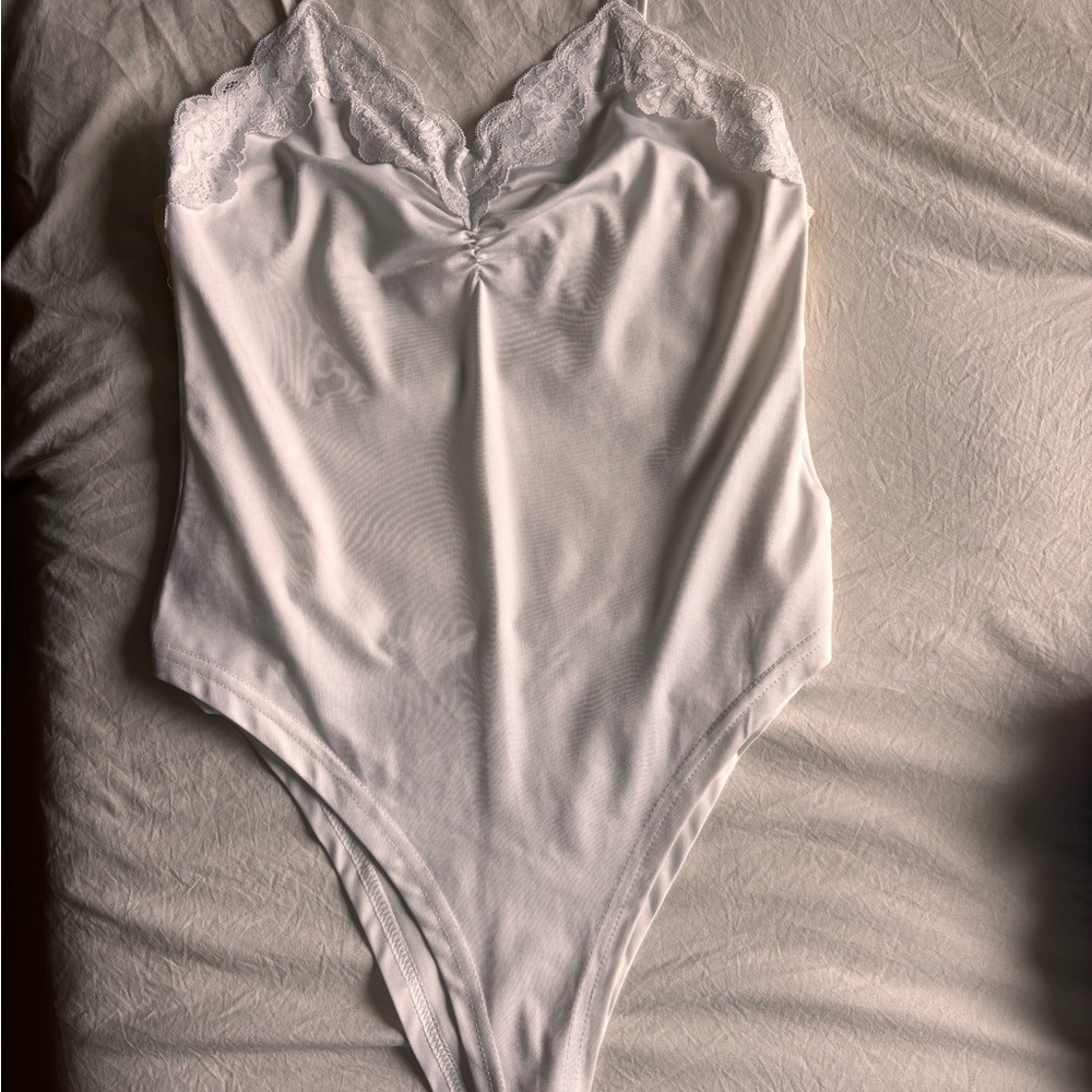 Elegant White Lace Bodysuit